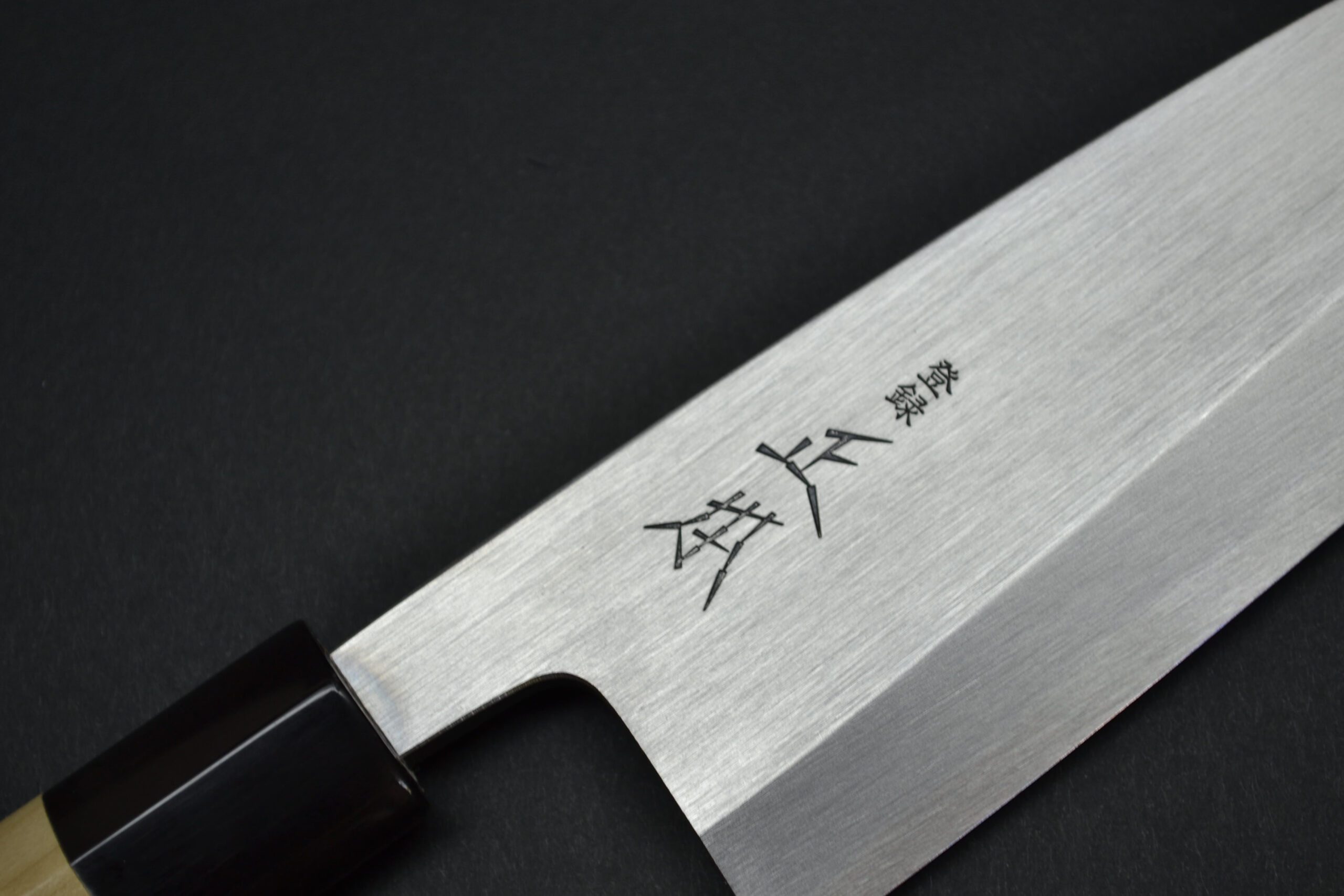 https://www.thesharpcook.com/wp-content/uploads/2023/09/Masamoto-KK-Deba-165mm-12-scaled.jpg